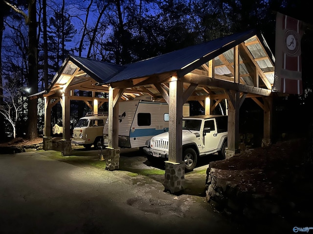 view of front of property with a carport