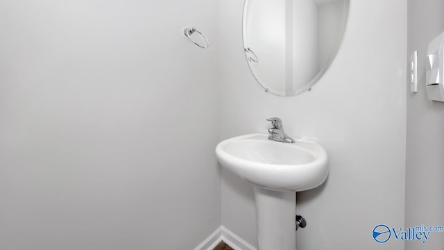 bathroom featuring baseboards