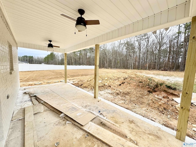 view of patio featuring ceiling fan