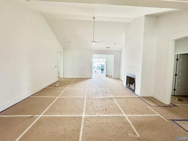 interior space with high vaulted ceiling and ceiling fan