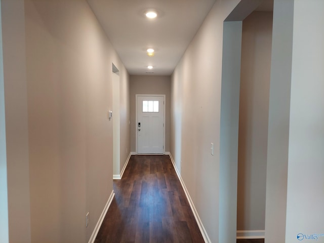 doorway featuring dark hardwood / wood-style flooring