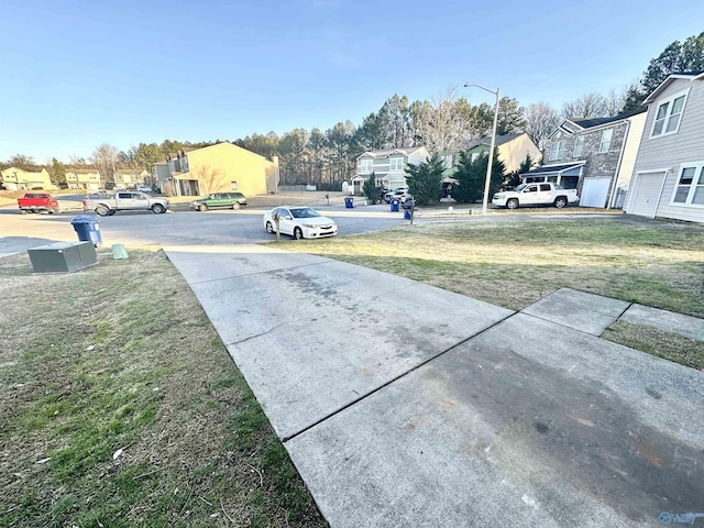 view of yard featuring a residential view