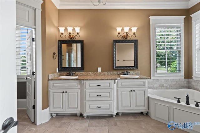 bathroom featuring vanity, a tub to relax in, and crown molding