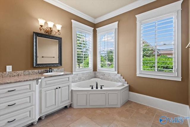 bathroom with crown molding, vanity, a washtub, and a wealth of natural light