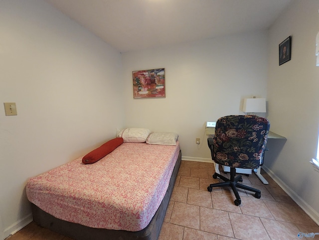 bedroom featuring tile patterned floors