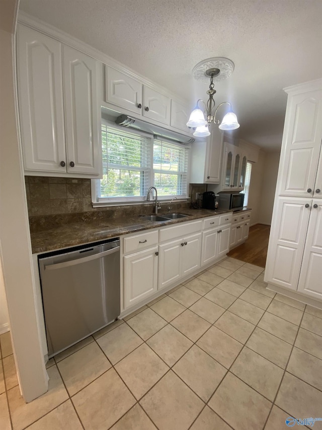 1702 Roseberry Dr, Scottsboro, AL 35769 - kitchen featuring a sink, white cabinets, and stainless steel appliances