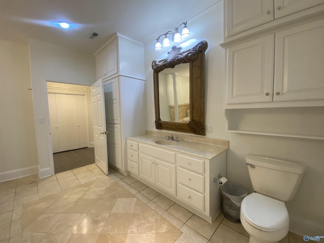 1702 Roseberry Dr, Scottsboro, AL 35769 - bathroom featuring tile patterned floors, visible vents, toilet, and vanity