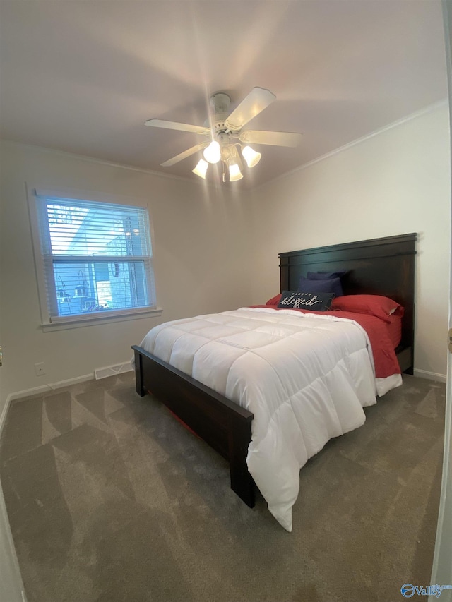 1702 Roseberry Dr, Scottsboro, AL 35769 - carpeted bedroom with visible vents, a ceiling fan, ornamental molding, and baseboards