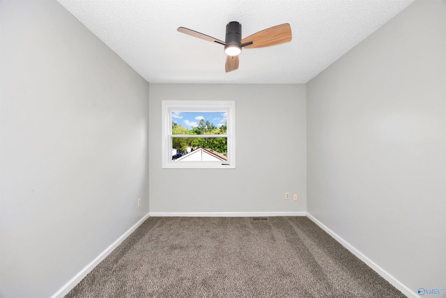 409 Hobbs Rd SE, Huntsville, AL 35803 - unfurnished room with carpet floors, a ceiling fan, and baseboards