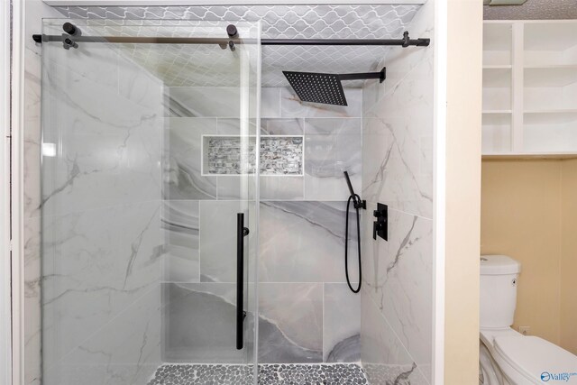 409 Hobbs Rd SE, Huntsville, AL 35803 - full bath featuring a marble finish shower and toilet