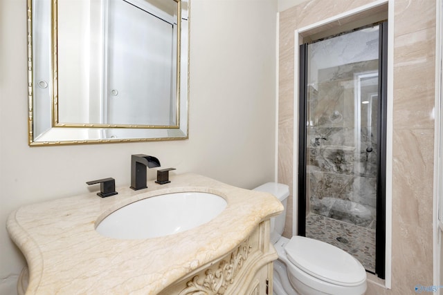 409 Hobbs Rd SE, Huntsville, AL 35803 - bathroom with a stall shower, vanity, and toilet