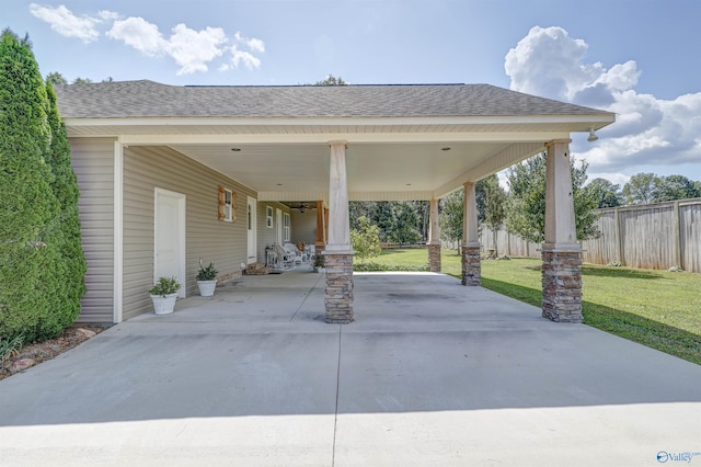 view of patio featuring a carport