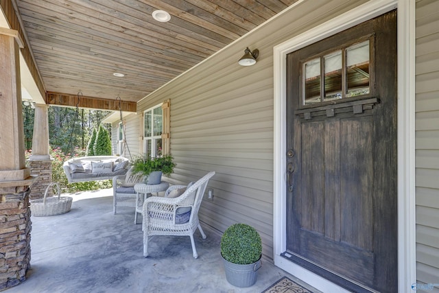 view of patio featuring covered porch