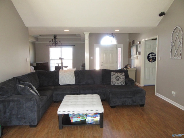 living area with wood finished floors and baseboards