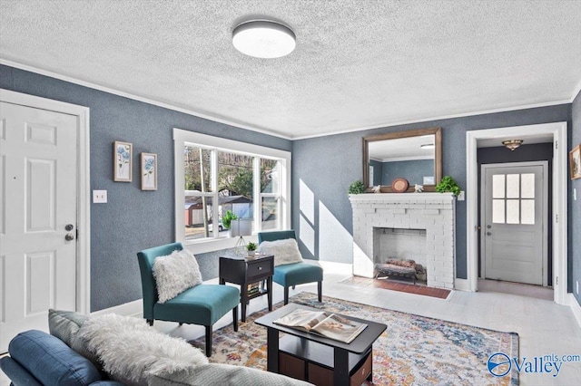 living room featuring a textured ceiling, a textured wall, ornamental molding, and a brick fireplace