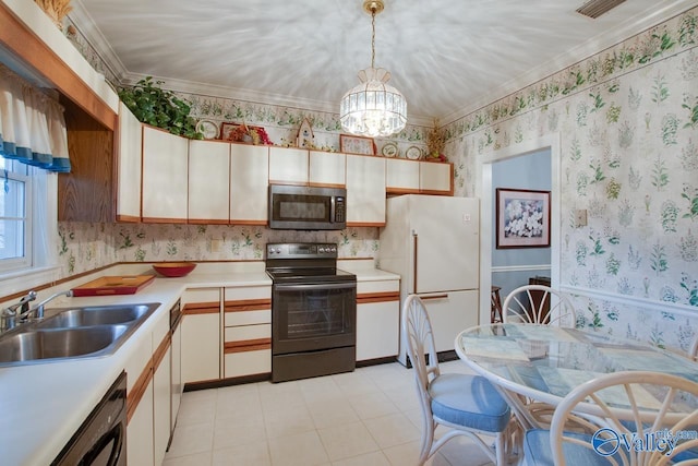 kitchen featuring crown molding, sink, pendant lighting, white refrigerator, and black electric range oven