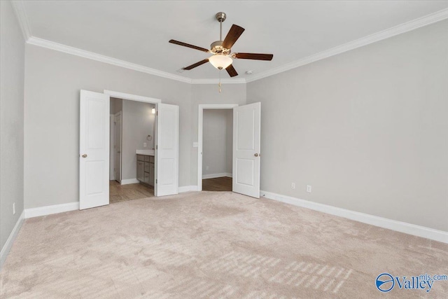 unfurnished bedroom with connected bathroom, light colored carpet, ceiling fan, and ornamental molding