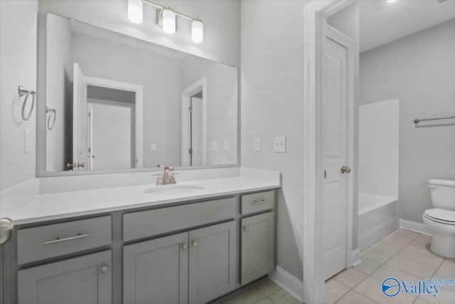 full bathroom featuring toilet, vanity, shower / bath combination, and tile patterned floors