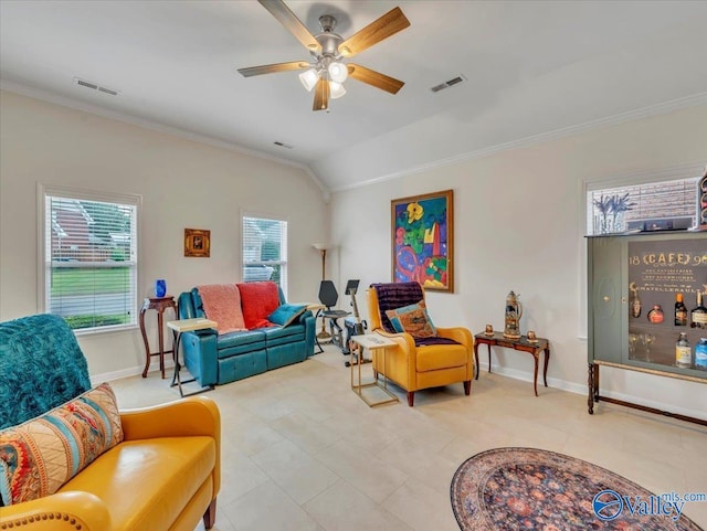 986 Tracey Ln, Decatur, AL 35601 - living area with ornamental molding, baseboards, a ceiling fan, vaulted ceiling, and light tile patterned floors