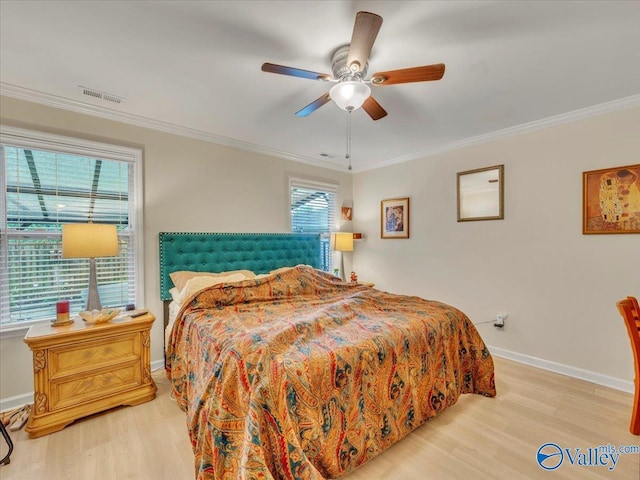 986 Tracey Ln, Decatur, AL 35601 - bedroom featuring light wood-style floors, baseboards, crown molding, and a ceiling fan