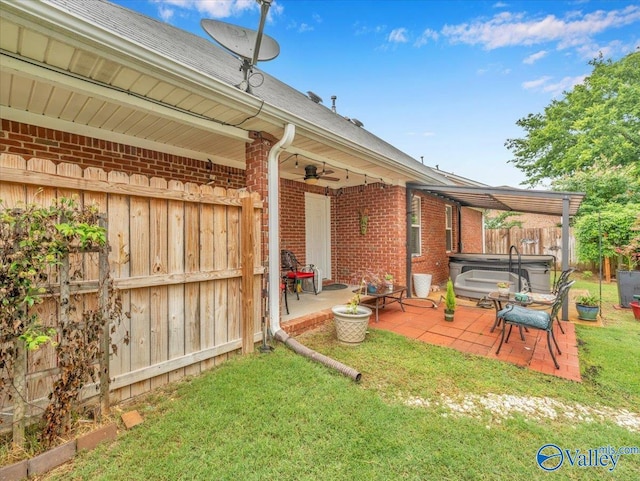 986 Tracey Ln, Decatur, AL 35601 - view of yard with a hot tub, a patio area, and ceiling fan