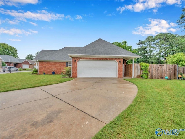 986 Tracey Ln, Decatur, AL 35601 - view of front of property featuring concrete driveway, brick siding, an attached garage, and a shingled roof