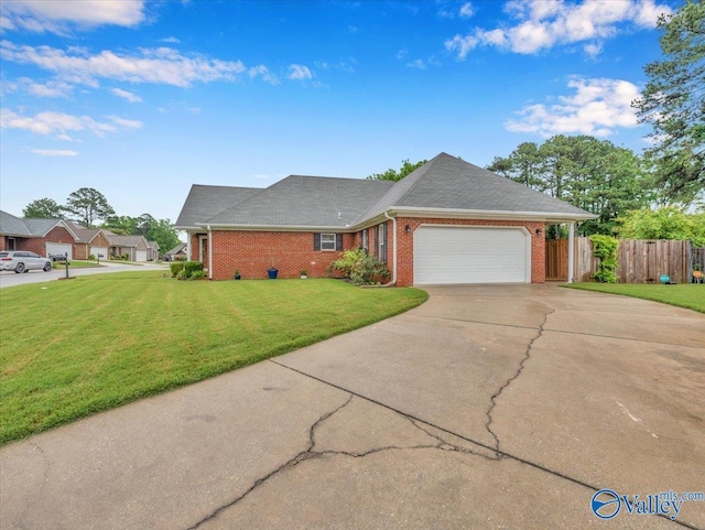 986 Tracey Ln, Decatur, AL 35601 - view of front of property with brick siding, an attached garage, and concrete driveway