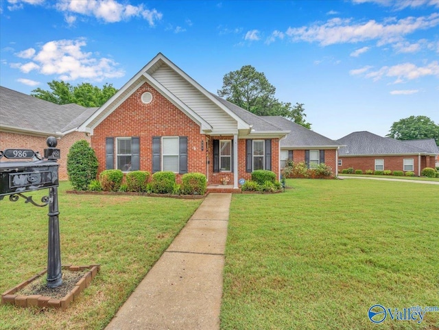 986 Tracey Ln, Decatur, AL 35601 - view of front of house with brick siding and a front lawn