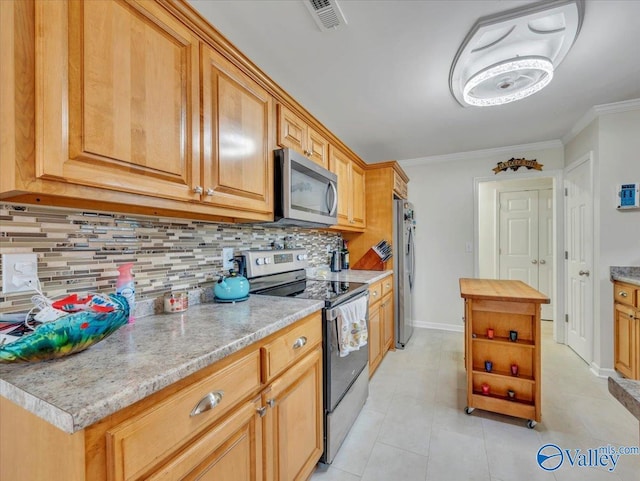 986 Tracey Ln, Decatur, AL 35601 - kitchen featuring stainless steel appliances, decorative backsplash, light tile patterned floors, ornamental molding, and wood counters