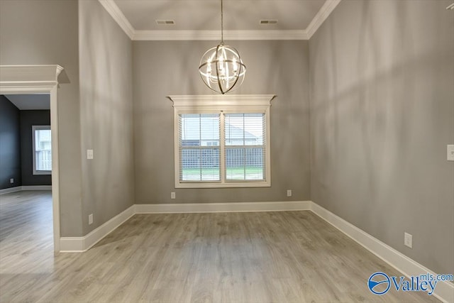 26415 Birkshire Ln, Athens, AL 35613 - spare room with a chandelier, wood finished floors, crown molding, and baseboards