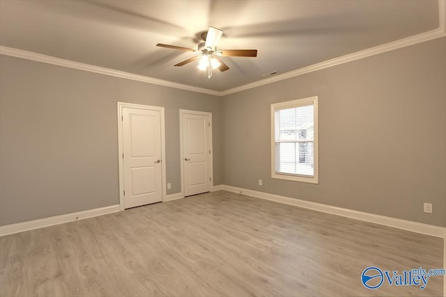 26415 Birkshire Ln, Athens, AL 35613 - unfurnished bedroom featuring wood finished floors, ornamental molding, baseboards, and a ceiling fan