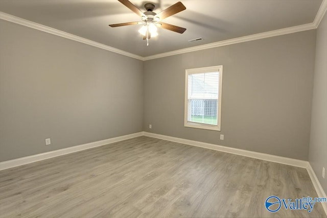 26415 Birkshire Ln, Athens, AL 35613 - empty room featuring ornamental molding, wood finished floors, baseboards, and a ceiling fan