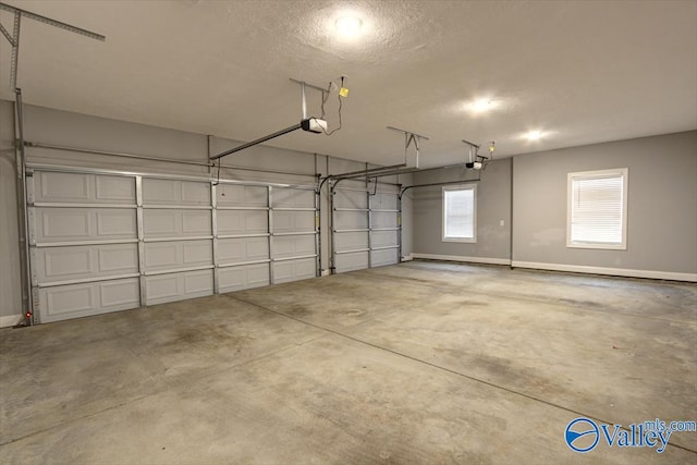 26415 Birkshire Ln, Athens, AL 35613 - garage with baseboards and a garage door opener