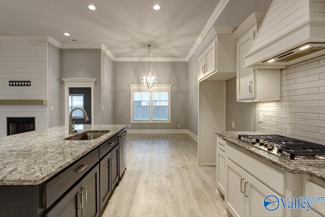 26415 Birkshire Ln, Athens, AL 35613 - kitchen featuring custom exhaust hood, appliances with stainless steel finishes, a sink, white cabinets, and recessed lighting