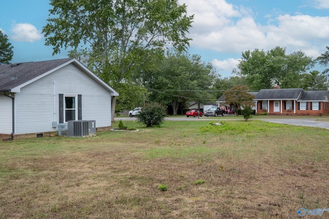 view of yard with central AC unit