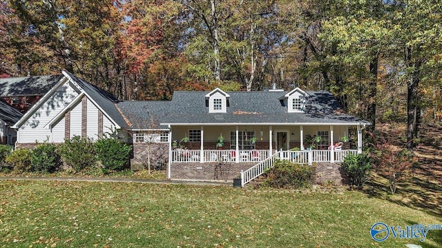 view of front of home featuring a front lawn and a porch