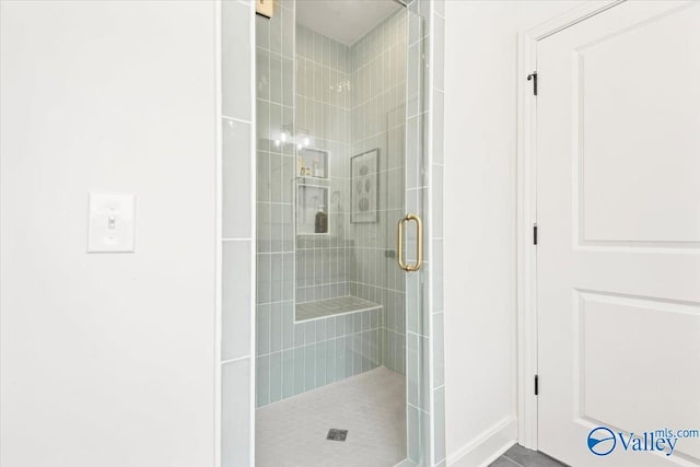 bathroom featuring walk in shower