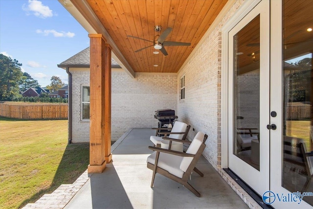 view of patio / terrace with french doors and ceiling fan