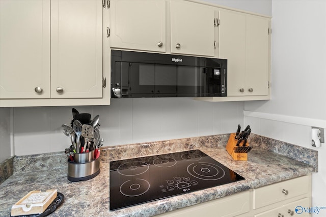 kitchen with black appliances