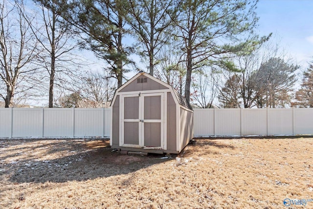 view of shed featuring a fenced backyard