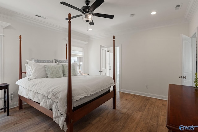 bedroom with dark wood-type flooring, ceiling fan, and ornamental molding