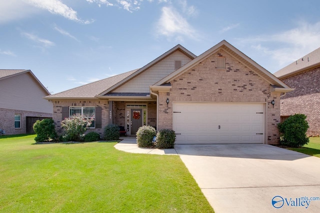 4304 Adventura Dr, Owens Cross Roads, AL 35763 - ranch-style home with brick siding, an attached garage, a front yard, and driveway