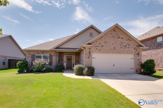4304 Adventura Dr, Owens Cross Roads, AL 35763 - view of front facade with brick siding, an attached garage, concrete driveway, and a front yard