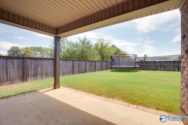 4304 Adventura Dr, Owens Cross Roads, AL 35763 - view of yard with a patio area and a trampoline