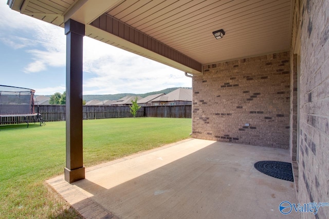 4304 Adventura Dr, Owens Cross Roads, AL 35763 - view of patio with a trampoline