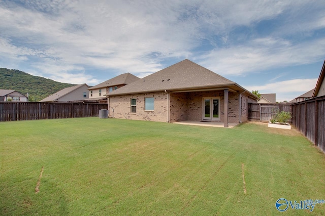 4304 Adventura Dr, Owens Cross Roads, AL 35763 - back of house featuring a patio area, brick siding, central air condition unit, and french doors