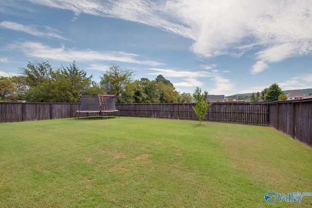4304 Adventura Dr, Owens Cross Roads, AL 35763 - view of yard featuring a trampoline