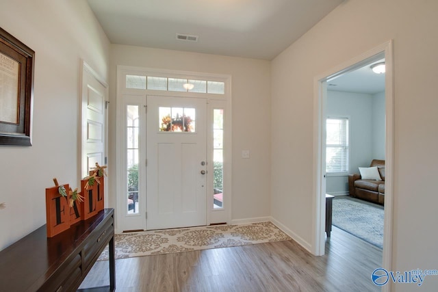 4304 Adventura Dr, Owens Cross Roads, AL 35763 - foyer entrance featuring wood finished floors and baseboards