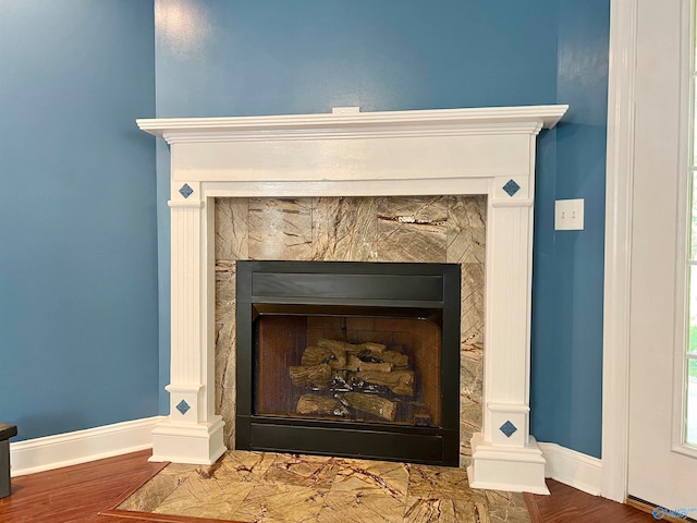 details featuring hardwood / wood-style flooring