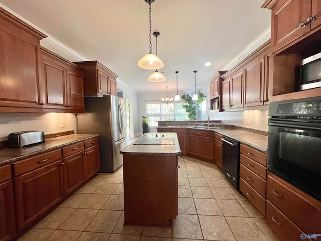 kitchen featuring a center island, black appliances, sink, ornamental molding, and decorative light fixtures